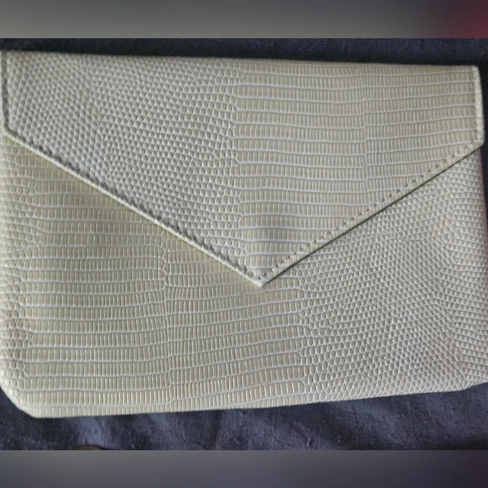 4 ipsy makeup/travel bags